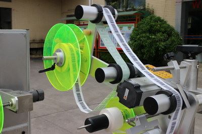 超声波剪切分条机 全自动防盗复标机 全自动商标贴标机 工厂主营图片|超声波剪切分条机 全自动防盗复标机 全自动商标贴标机 工厂主营产品图片由东莞市利瀚机械公司生产提供-